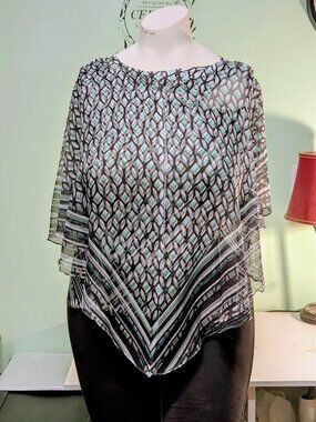 Flowing, sheer tunic with matching tank top underneath (attached)